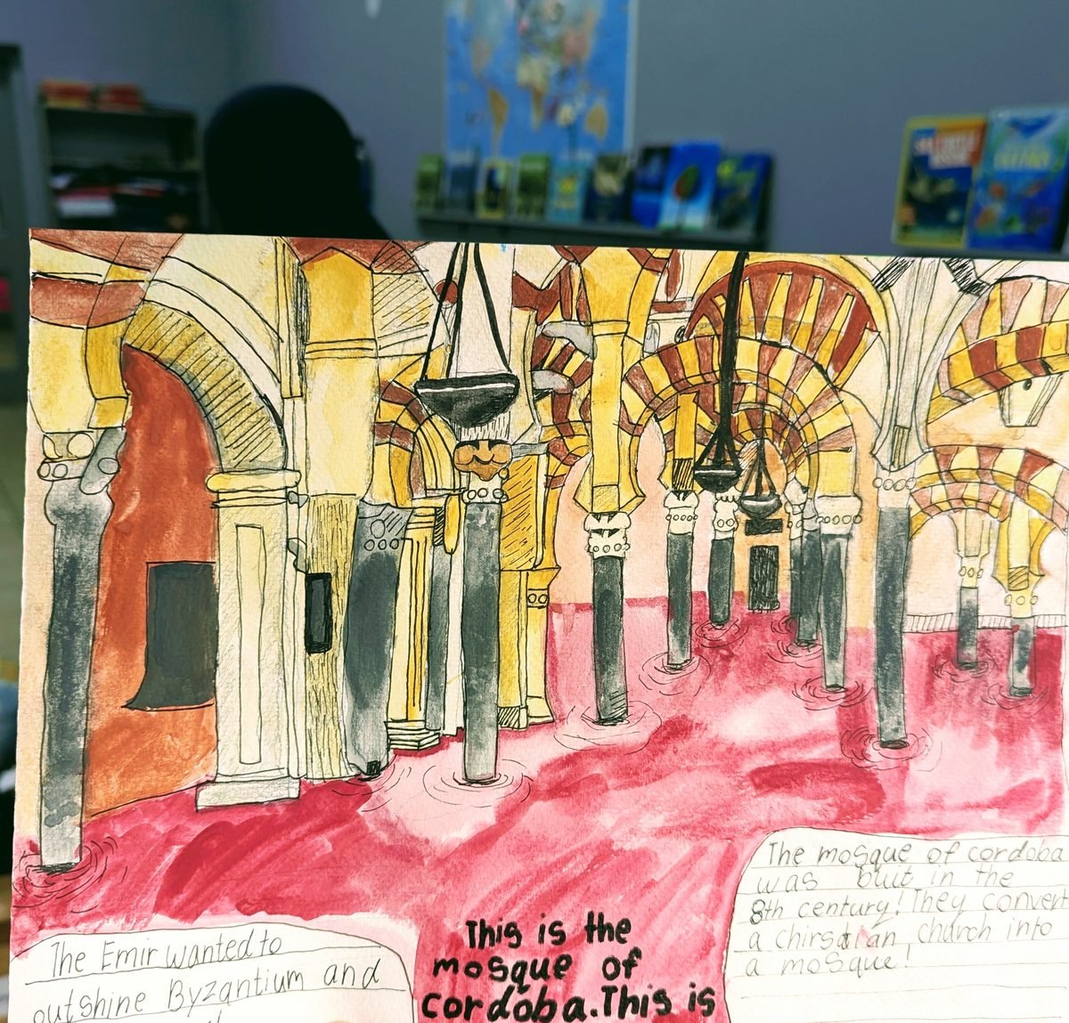 A child's watercolour of the Mosque of Cordoba with handwritten notes about the Emir and the 8th century